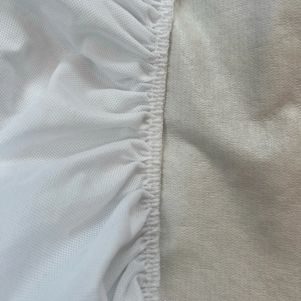 White twin waterproof mattress cover - to protect twin sized mattress. Like new